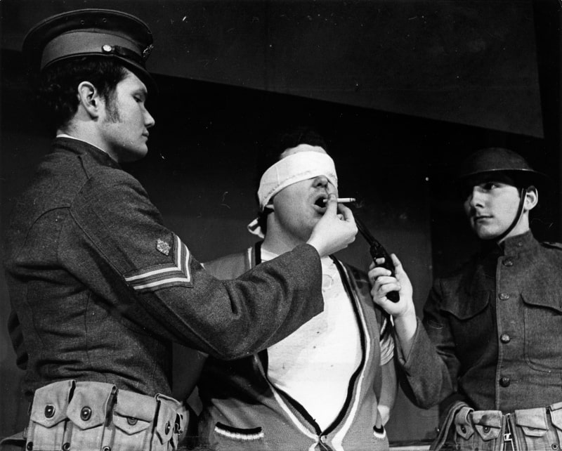 Craig Dunkerly '69, Dave Stewart '68, and Toby Webb '69 in a scene from A Man's A Man by Bertolt Brecht.