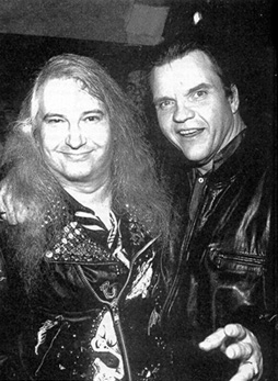 photo of Jim Steinman and Meat Loaf, both wearing leather jackets