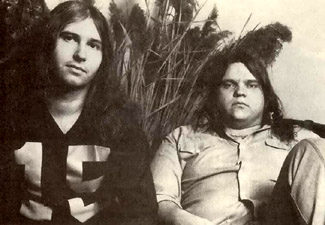 1978 photo of Jim Steinman (left) and Meat Loaf (right), both seated