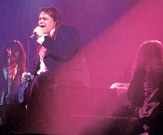 concert photo from 1978 - left-to-right: Rory Dodd (backing), Meat Loaf (lead vocals), Jim Steinman (keyboards)