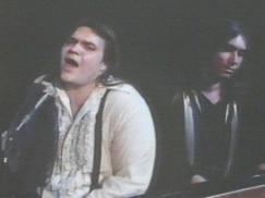 Meat Loaf (left, singing) and Jim Steinman (right, playing piano)