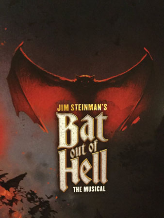 a large black bat with red wings and red eyes stands, looming above the textual logo for Jim Steinman's Bat Out Of Hell