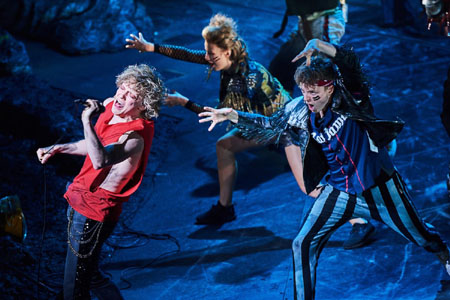 Scene from Bat Out Of Hell The Musical : left-to-right : Strat (Andrew Polec), Bessamey (Phoebe Hart), Astroganger (Isaac Edwards)