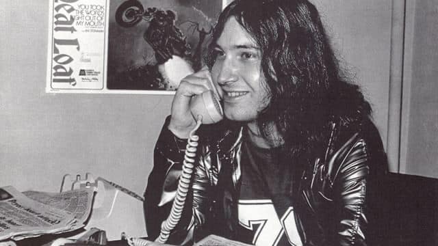 Jim Steinman, using a telephone
