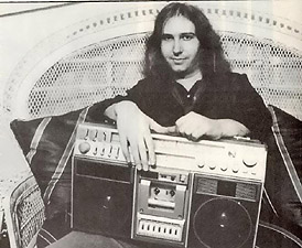Jim Steinman holding a stereo tape deck
