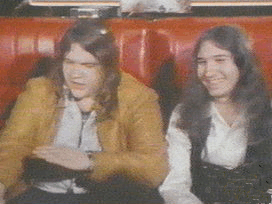photo from 1978 - Meat Loaf (left) in a tan jacket and shirt. Jim Steinman (right)
